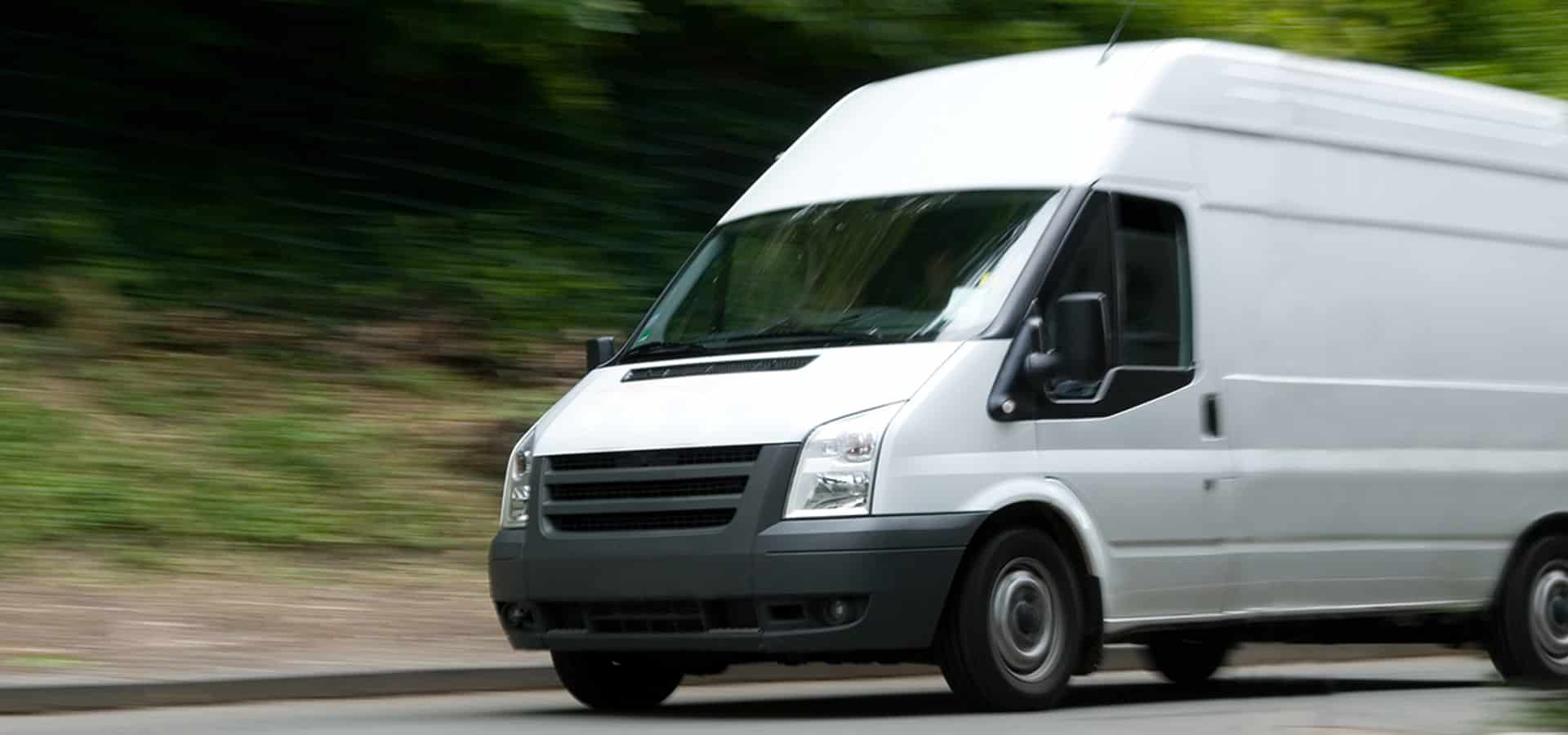White van with motion blur